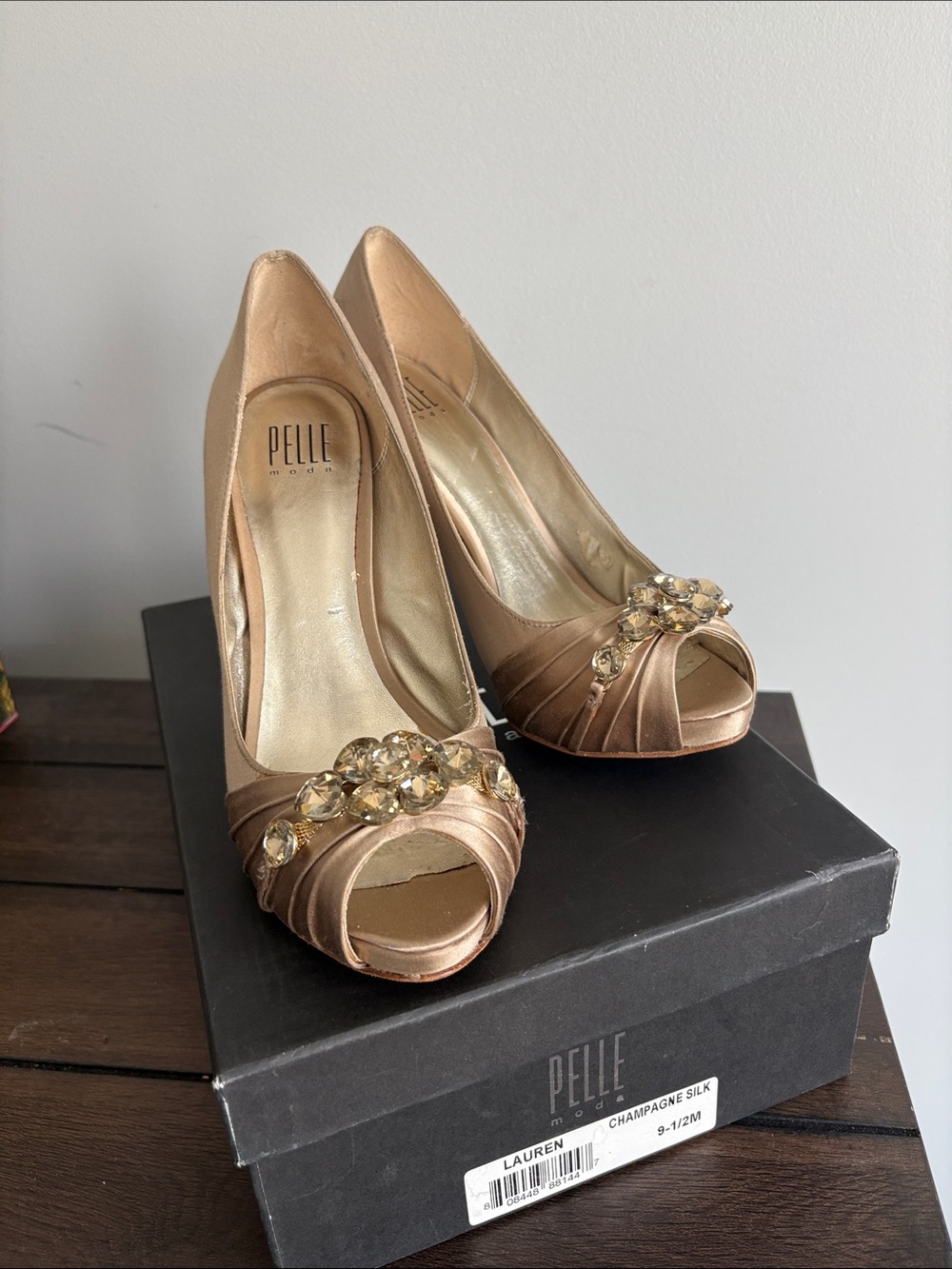 Pelle Moda Champagne Satin Peep-Toe Heels with Crystal Embellishment